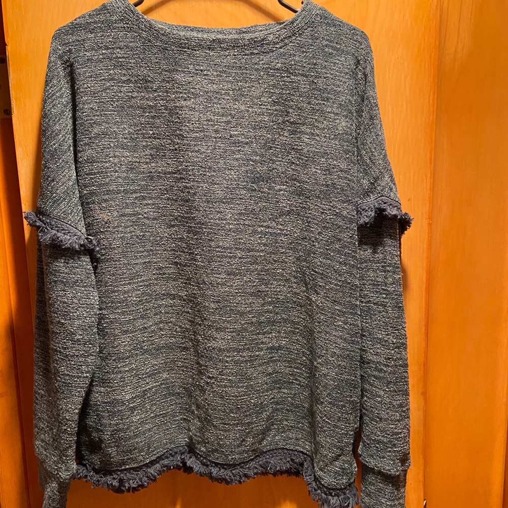 Cute sweater with fringe detail